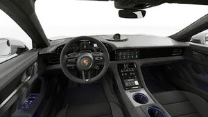 Interiørvisning, der viser rattet og instrumentbrættet på Taycan GTS Sport Turismo