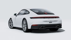 Vista exterior de 911 Carrera 4S mostrando la parte trasera y el lado izquierdo del coche