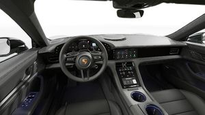 Vista interior que muestra el volante y el salpicadero de Taycan Black Edition