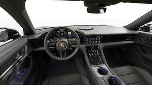 Vista interior que muestra el volante y el salpicadero de Taycan 4S Black Edition