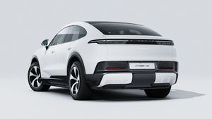 Exterior view of Cayenne S Coupé Electric showing the back and left side of the car