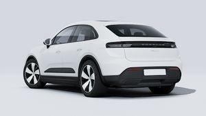 Exterior view of Macan 4 showing the back and left side of the car
