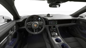 Interior view showing the steering wheel and dashboard of Taycan GTS