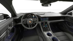 Interior view showing the steering wheel and dashboard of Taycan 4 Black Edition