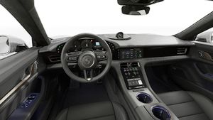 Interior view showing the steering wheel and dashboard of Taycan Turbo Cross Turismo