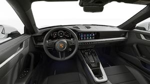 Interior view showing the steering wheel and dashboard of 911 Carrera 4S