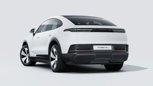 Exterior view of Cayenne Coupé Electric showing the back and left side of the car