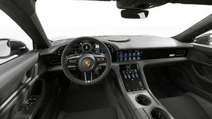 Vista interior que muestra el volante y el salpicadero de Taycan Turbo GT with Weissach package