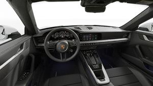 Interior view showing the steering wheel and dashboard of 911 Carrera Cabriolet