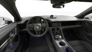 Interior view showing the steering wheel and dashboard of Taycan GTS