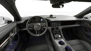 Vista interior que muestra el volante y el salpicadero de Taycan Turbo