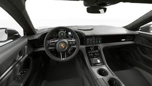 Vista interior que muestra el volante y el salpicadero de Taycan Turbo GT with Weissach Package