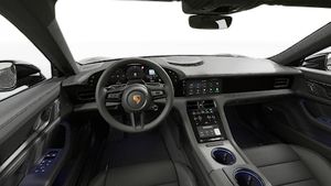 Vista interior que muestra el volante y el salpicadero de Taycan 4S Black Edition
