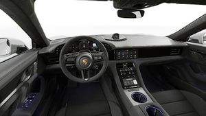 Pogled iznutra koji prikazuje upravljač i kontrolnu ploču Taycan GTS Sport Turismo