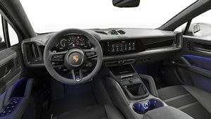 Interior view showing the steering wheel and dashboard of Cayenne GTS Coupé