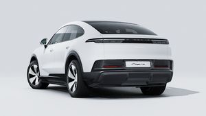 Exterior view of Cayenne Coupé Electric showing the back and left side of the car