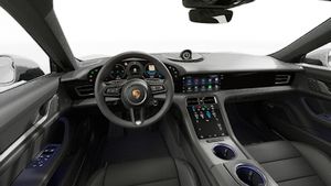 Interior view showing the steering wheel and dashboard of Taycan 4S Cross Turismo