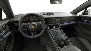 Interior view showing the steering wheel and dashboard of Panamera GTS