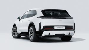 Exterior view of Cayenne Turbo Electric showing the back and left side of the car