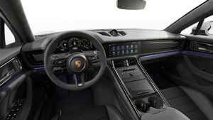 Interior view showing the steering wheel and dashboard of Panamera GTS