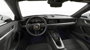 Interior view showing the steering wheel and dashboard of 911 Carrera Cabriolet