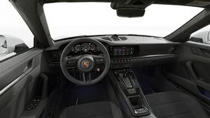 Interior view showing the steering wheel and dashboard of 911 Targa 4 GTS