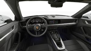 Interior view showing the steering wheel and dashboard of 911 Targa 4S
