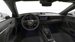 Interior view showing the steering wheel and dashboard of 911 Carrera 4 GTS Cabriolet