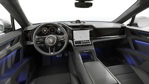 Interior view showing the steering wheel and dashboard of Cayenne Turbo Electric