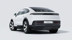 Exterior view of Cayenne Coupé Electric showing the back and left side of the car