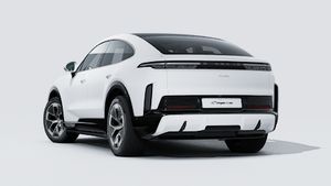 Exterior view of Cayenne Turbo Coupé Electric showing the back and left side of the car