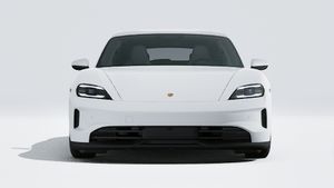 Vista esterna di Taycan Sport Turismo che mostra la parte anteriore della vettura