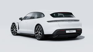Vista esterna di Taycan Sport Turismo Black Edition che mostra la parte posteriore e il lato sinistro della vettura