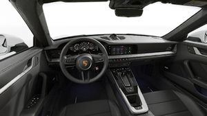 Interior view showing the steering wheel and dashboard of 911 Carrera 4S Cabriolet