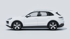 Exterior view of Cayenne E-Hybrid showing the left side of the car