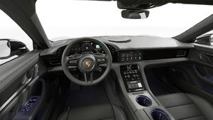 Interior view showing the steering wheel and dashboard of Taycan 4S Black Edition