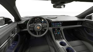 Interior view showing the steering wheel and dashboard of Taycan Black Edition