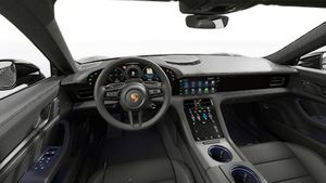 Interior view showing the steering wheel and dashboard of Taycan 4S Black Edition