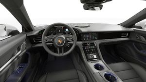 Interior view showing the steering wheel and dashboard of Taycan 4 Cross Turismo