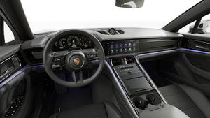 のステアリングホイールとダッシュボードを示す室内図。 Panamera 4 E-Hybrid