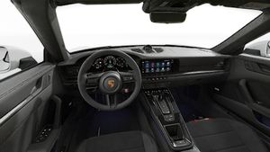Interior view showing the steering wheel and dashboard of 911 Carrera GTS Cabriolet