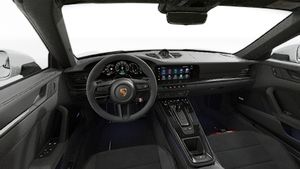 Interior view showing the steering wheel and dashboard of 911 Targa 4 GTS