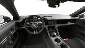 Interior view showing the steering wheel and dashboard of Taycan Turbo GT with Weissach Package
