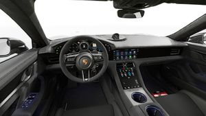 Interior view showing the steering wheel and dashboard of Taycan Turbo GT
