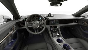 Interior view showing the steering wheel and dashboard of Taycan Turbo Cross Turismo