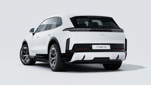 Exterior view of Cayenne Turbo Electric showing the back and left side of the car