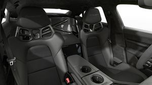 Interior view showing the front seats of Taycan Turbo GT with Weissach Package