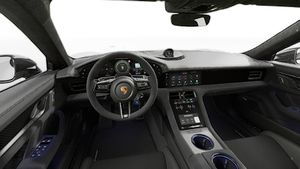 Vue de l'intérieur montrant le volant et le tableau de bord d'un véhicule de transport de marchandises. Taycan Turbo GT