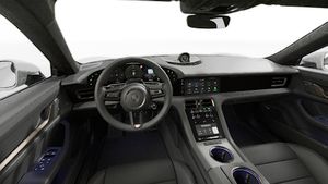 Вид изнутри на рулевое колесо и приборную панель Taycan Turbo Sport Turismo