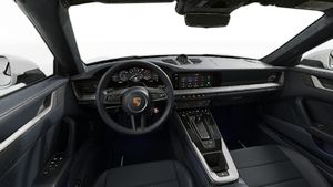 Interior view showing the steering wheel and dashboard of 911 Carrera Cabriolet